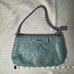 Coach Light blue large wristlet. Gently loved and great to take for a quick trip